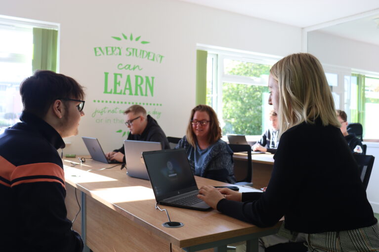 EMA Accountancy Apprentices sat with their Trainer, Lottie.