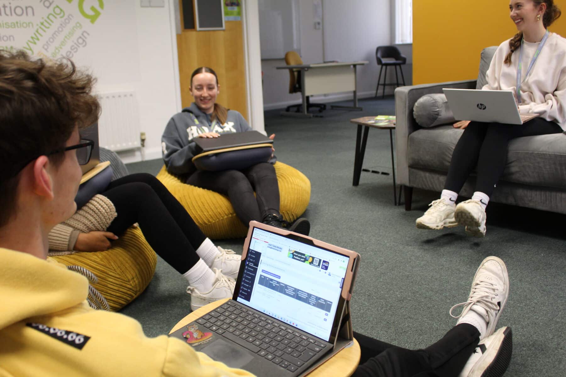 EMA Training Marketing Apprentices sat in the Digital Training Hub, in Derby City Centre.