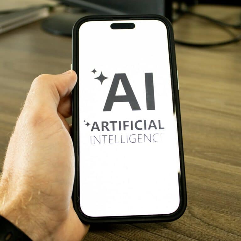 Mobile phone screen showing AI logo